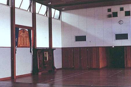 The main hall with the War Memorial board and the Howard Davis Memorial.