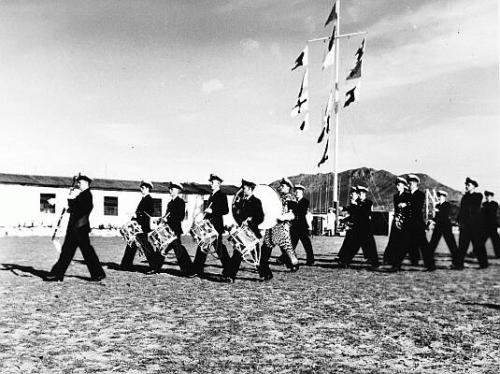 95The band leads the parade out of the grounds en route to Gordons Bay