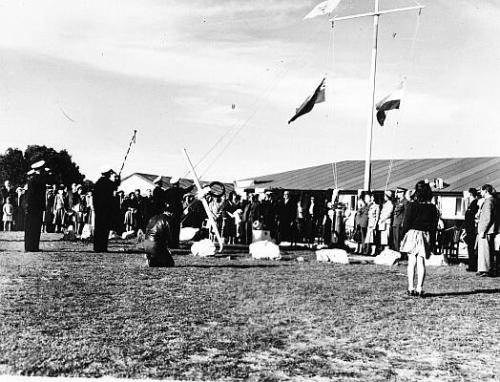 Lowering the flags for the last time on Red Hill.