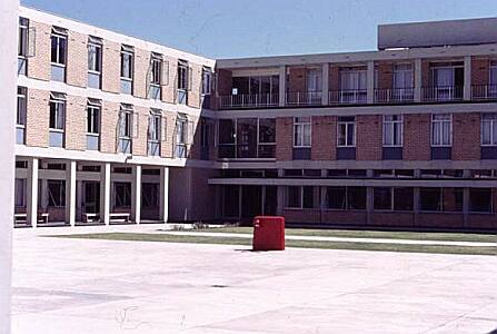 Accommodation Block. To the left(in the sun), the cadets' section. Ground Floor - cadets' lounge; First Floor - Starboard Watch; Second Floor - Port Watch. To the right (in the shade): On the ground floor the dining room; First & Second Floors - 'Senior Students' Rooms.
