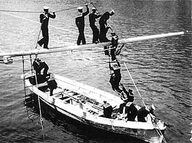 Manning the cutter at the boom